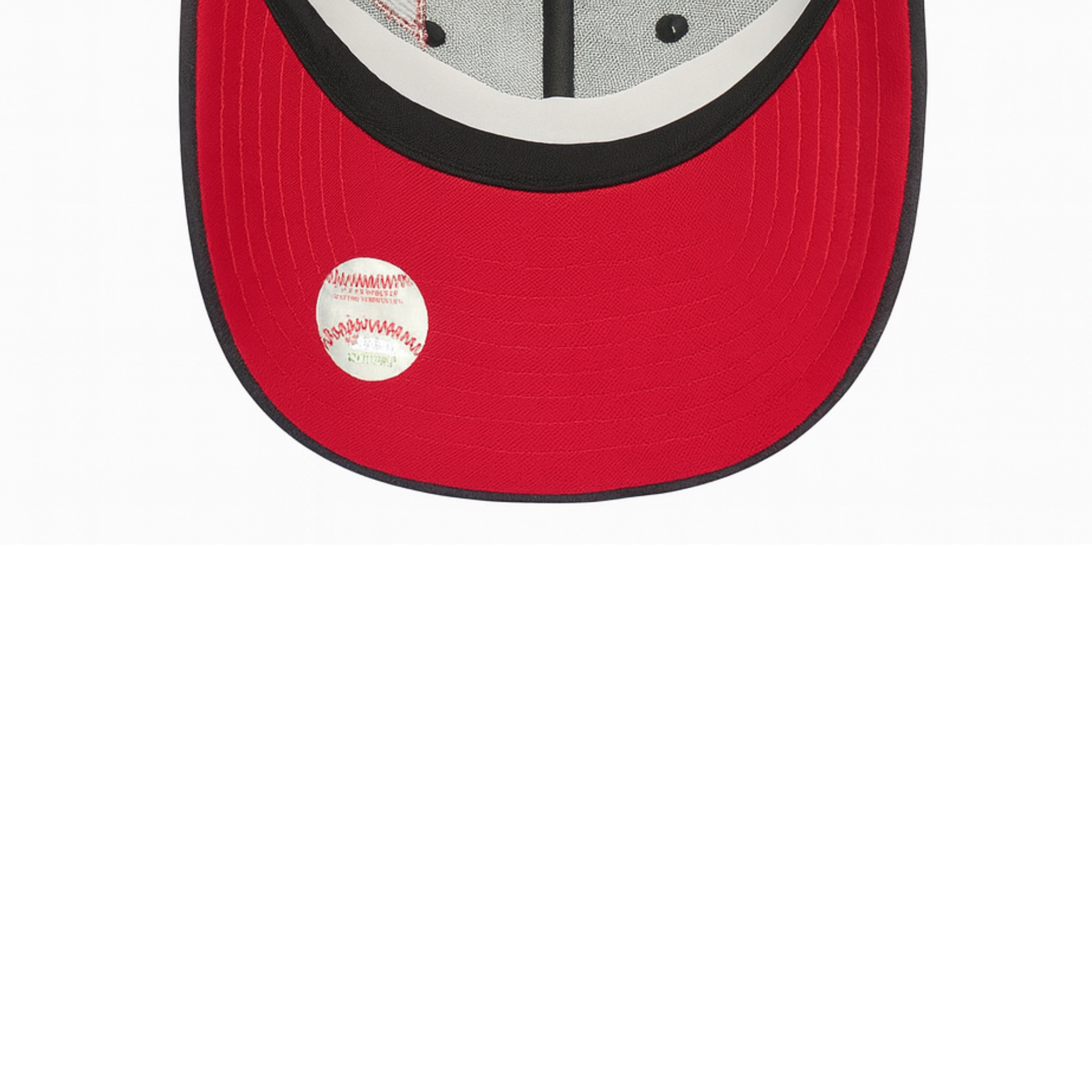 Underneath view of a black New Era 9FORTY baseball cap with a red under-brim, showing interior taping, star embroidery, and adjustable snapback closure on a white background.