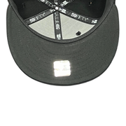 black under visor of Las Vegas Raiders Script Black Silver Fitted Hat