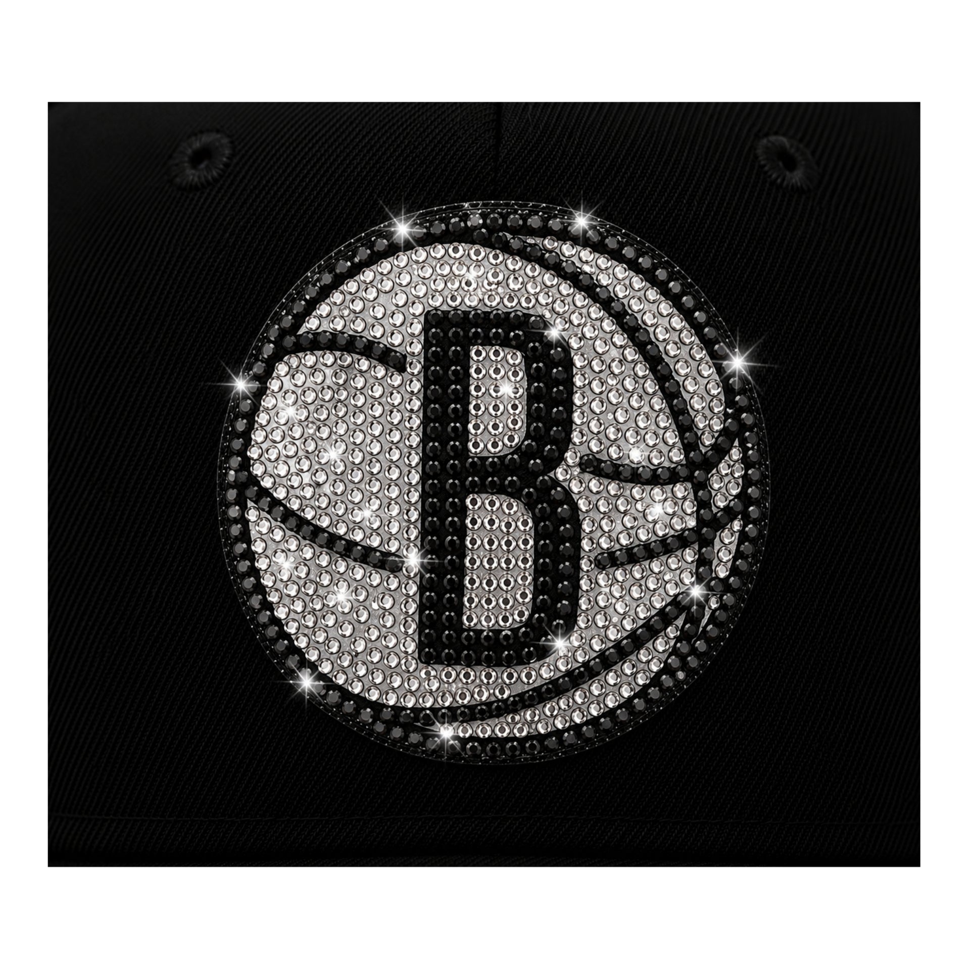 Basketball with rhinestone-studded design on a black background