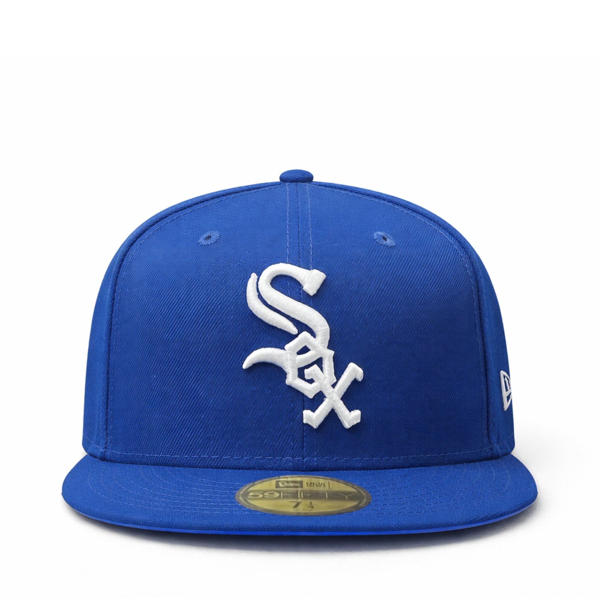 Blue baseball cap with white chicago white sox baseball team logo on a white background