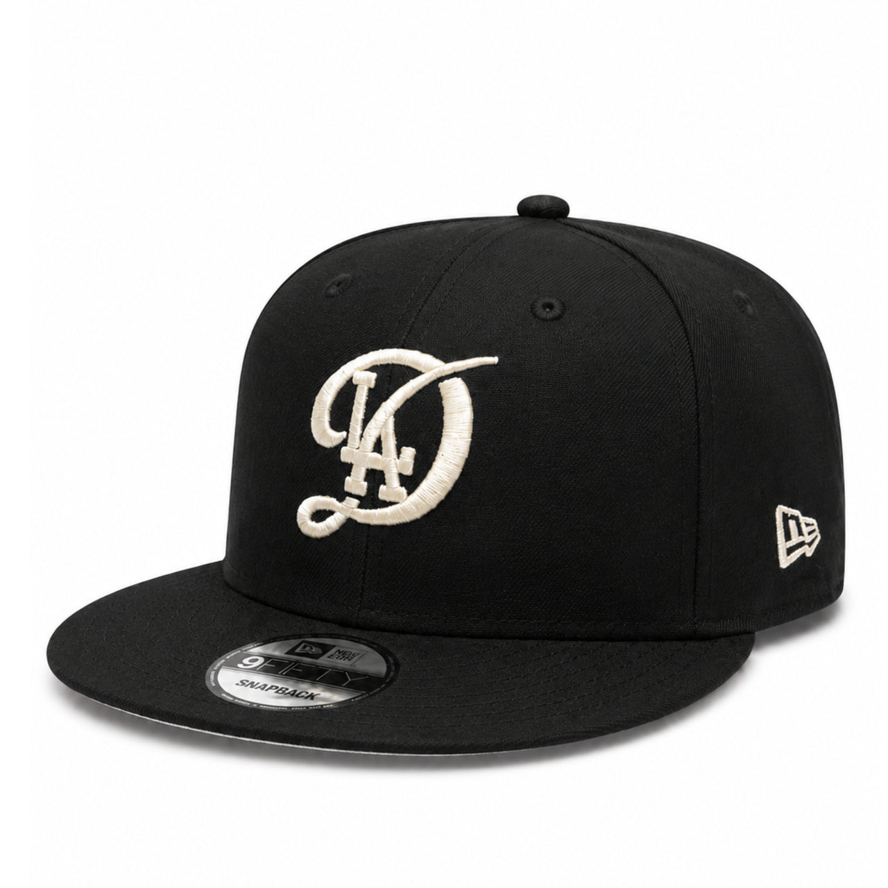 New Era Los Angeles Dodgers City Connect Black Ivory 9FIFTY Snapback Hat front angle view