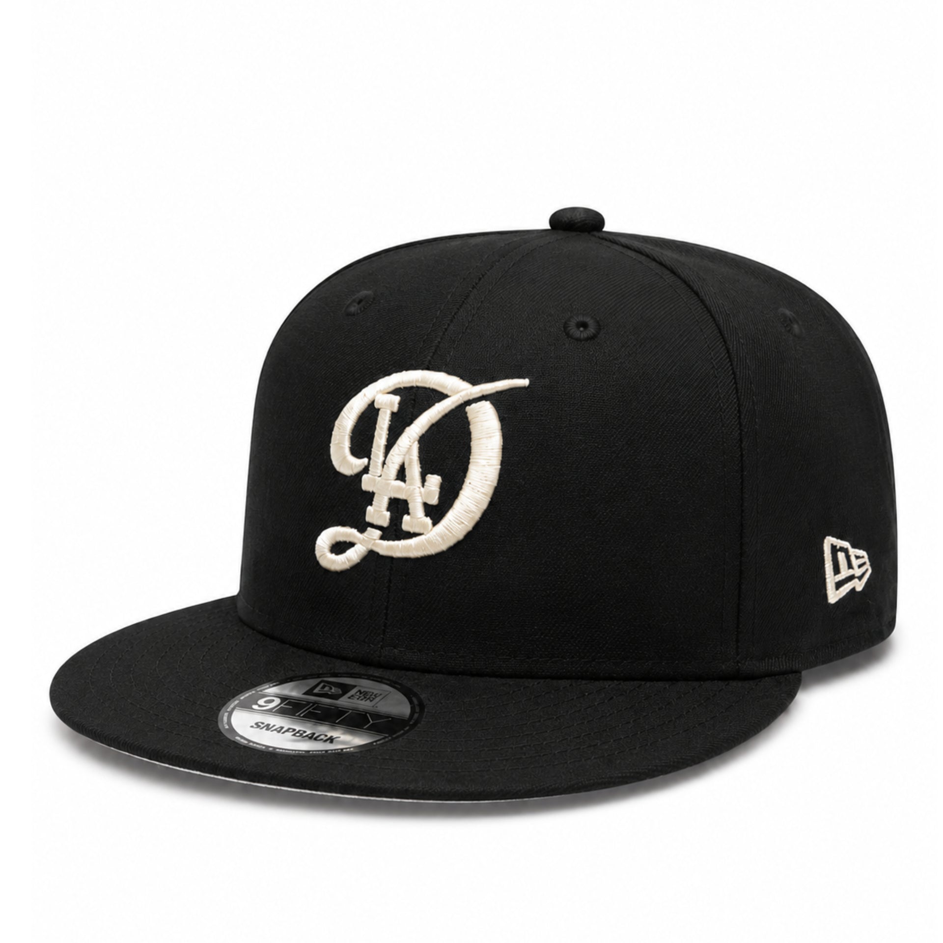 New Era Los Angeles Dodgers City Connect Black Ivory 9FIFTY Snapback Hat front angle view