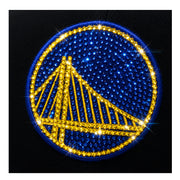 Decorative emblem with blue and gold colors on a black background