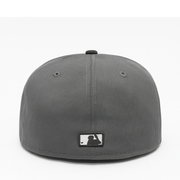 Gray baseball cap with a logo on the back against a white background