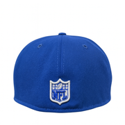 Back view of a royal blue New Era fitted cap featuring an embroidered white and blue NFL shield logo, displayed against a white background.