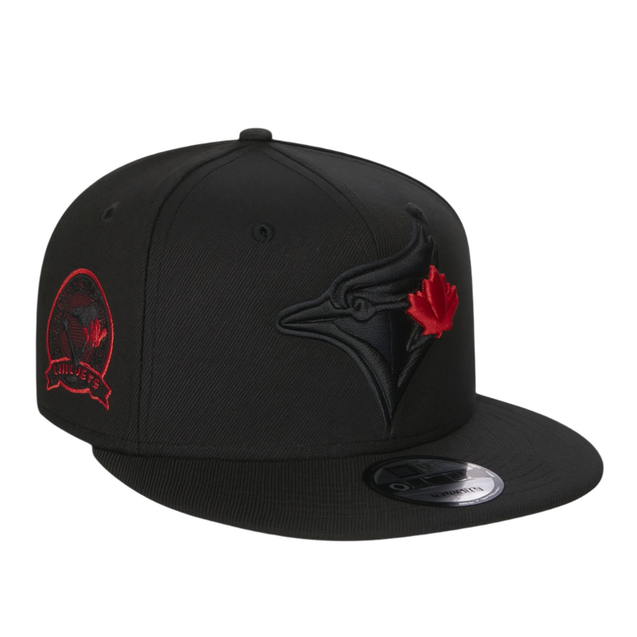 black Toronto Blue Jays New Era 9FIFTY snapback hat with an embroidered team logo and red maple leaf on the front panel.