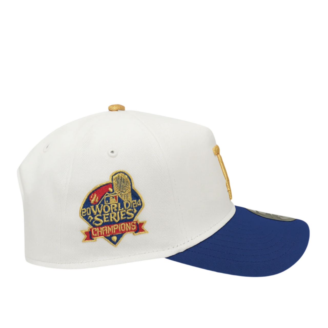 Side view of a New Era 9FORTY A-Frame cap with a white crown and royal blue brim, featuring a 2024 World Series Champions patch embroidered in red, gold, and navy on the side panel.