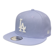 A lavender Los Angeles Dodgers New Era 9FIFTY snapback hat with a white embroidered LA logo, displayed on a white background.
