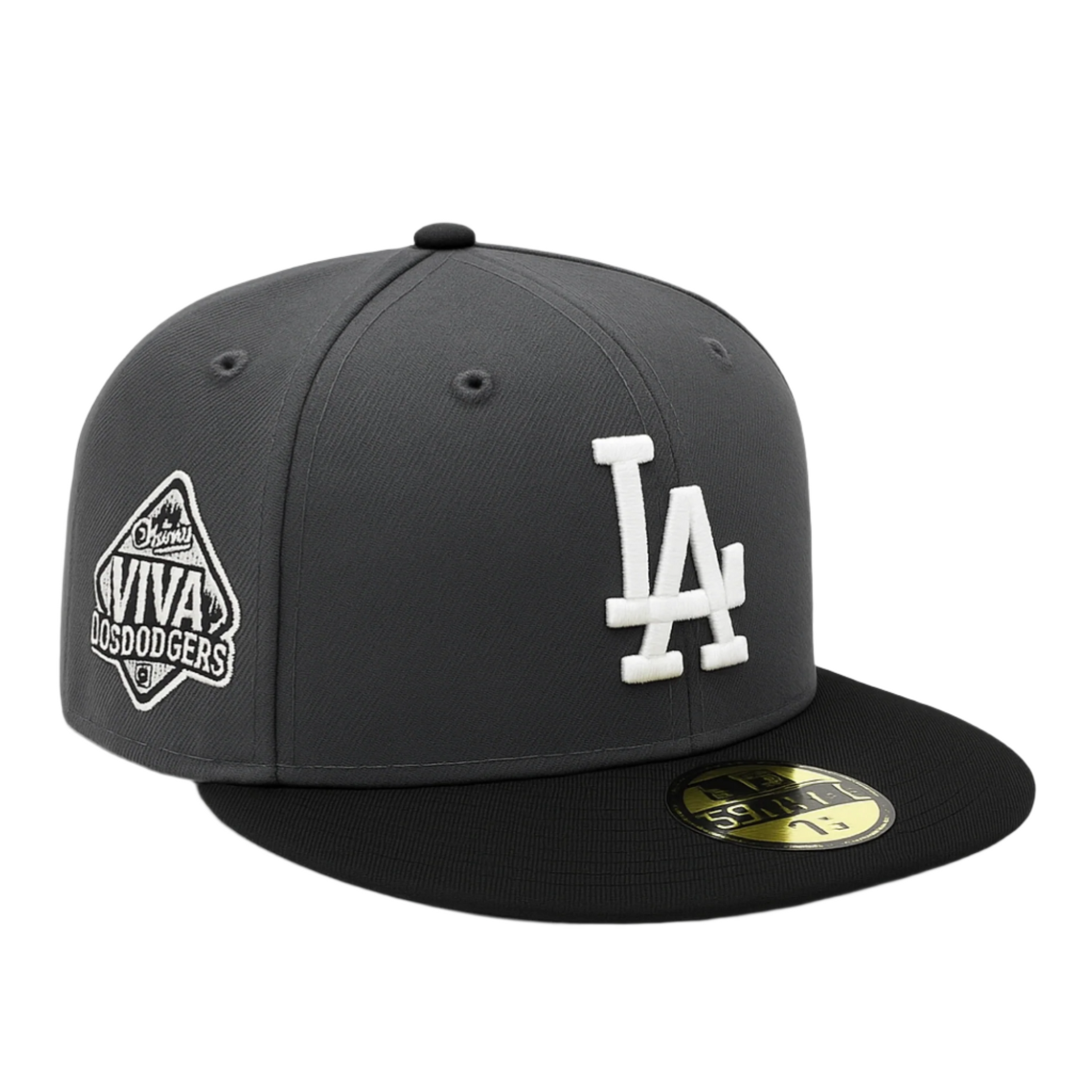 Graphite and black two-tone New Era 59FIFTY fitted cap featuring a white LA front logo, a 'Viva Los Dodgers' patch on the side, and a gold size sticker on the flat black brim, displayed on a clean white background.