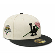 Baseball cap with decorative rose elements on a white background