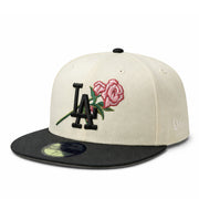 Baseball cap with embroidered rese design on a white background