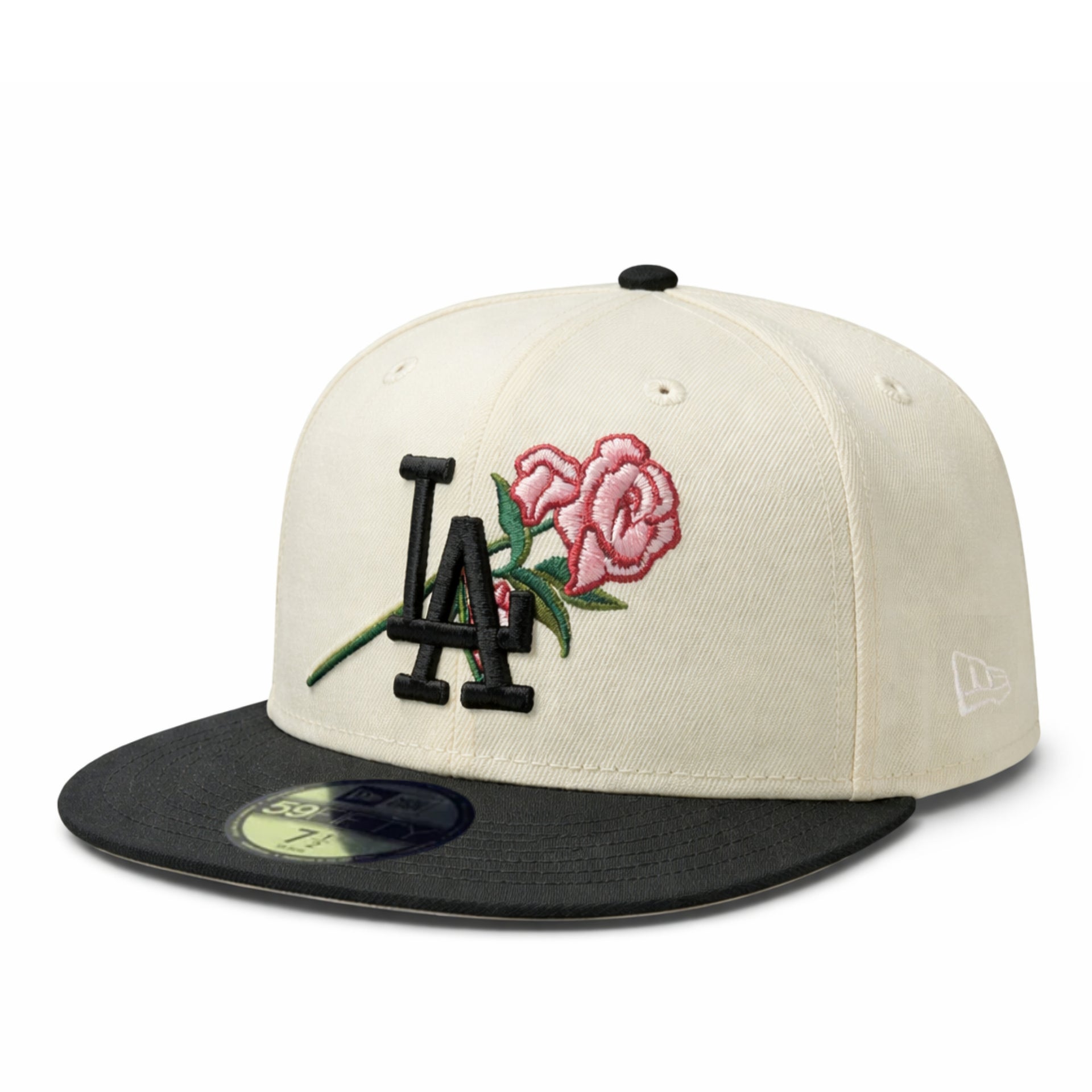 Baseball cap with embroidered rese design on a white background
