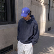 Man wearing ’47 Brand Los Angeles Dodgers royal blue MVP adjustable hat with white LA logo