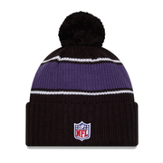 Back of New Era Baltimore Ravens 2024 Sideline Black Cuffed Pom Knit Beanie