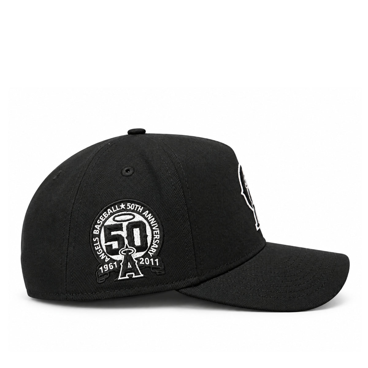 Close side view of New Era Angels black 9FORTY A-Frame hat featuring the Angels Baseball 50th Anniversary 1961-2011 embroidered patch