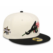 Baseball cap with floral design and logo on a white background