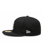 Blue baseball cap with MLB logo on a white background