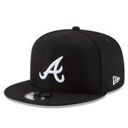 New Era Atlanta Braves Black White 9FIFTY Snapback Hat front left angle view