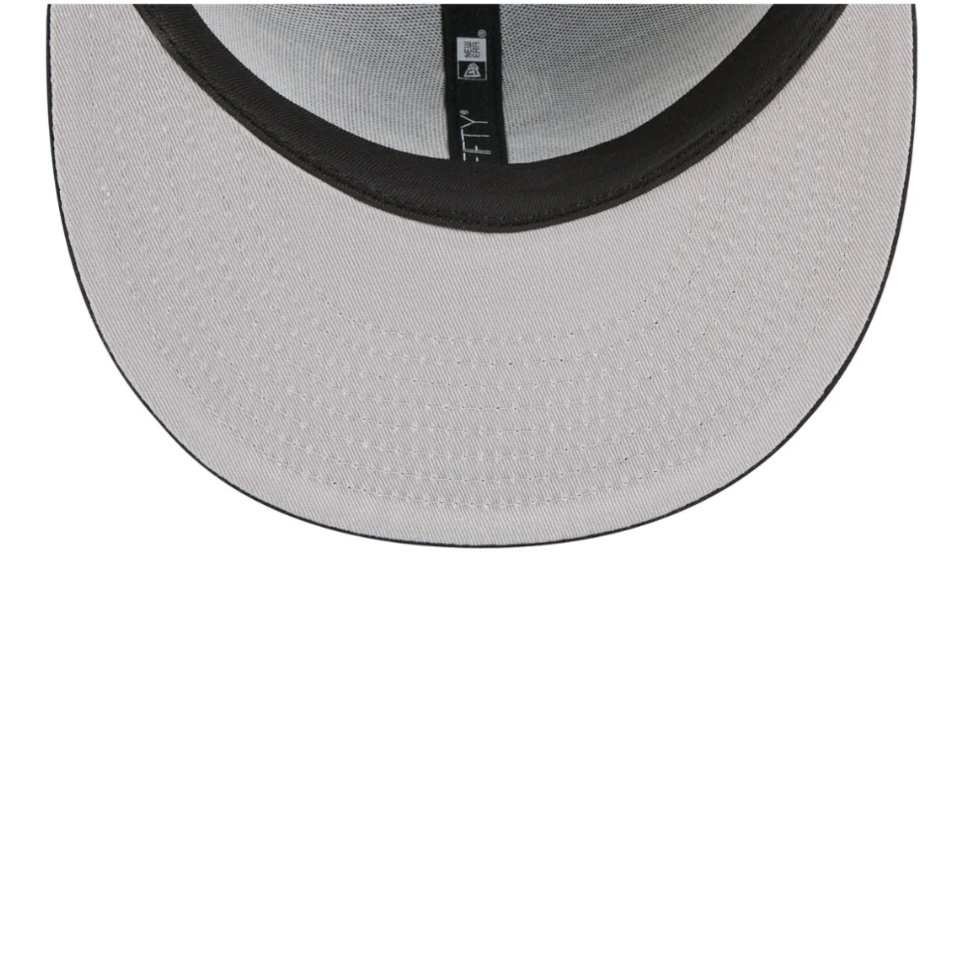 New Era Braves Bugs Bunny 9FIFTY snapback hat navy undervisor detail showing inner lining and stitching