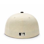 Beige baseball cap with a logo on a white background