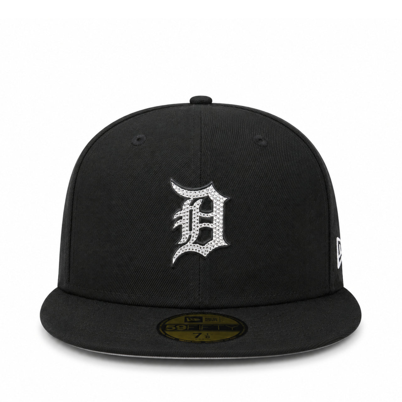 A black fitted baseball cap with a silver rhinestone-embellished 'D' logo on the front, representing the Detroit Tigers. It features a gold-toned size sticker on the brim and a small white New Era flag logo on the side.