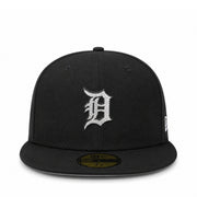 A black fitted baseball cap with a silver rhinestone-embellished 'D' logo on the front, representing the Detroit Tigers. It features a gold-toned size sticker on the brim and a small white New Era flag logo on the side.