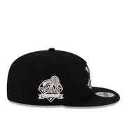 side view of New Era Los Angeles Dodgers Born x Raised 2024 World Series Champions Black 9FIFTY Snapback Hat
