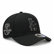 New Era Los Angeles Dodgers World Series Champions 9FORTY A-Frame snapback in black with metallic silver LA embroidery and commemorative side patch, front angled view