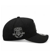 Side profile of black New Era Dodgers 9FORTY A-Frame cap featuring the metallic silver 2024 World Series championship patch and pre-curved visor