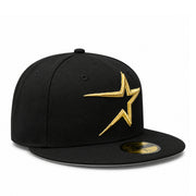 angled view of New Era Houston Astros Cooperstown 59FIFTY fitted hat in black with metallic gold star logo and gold MLB back logo.
