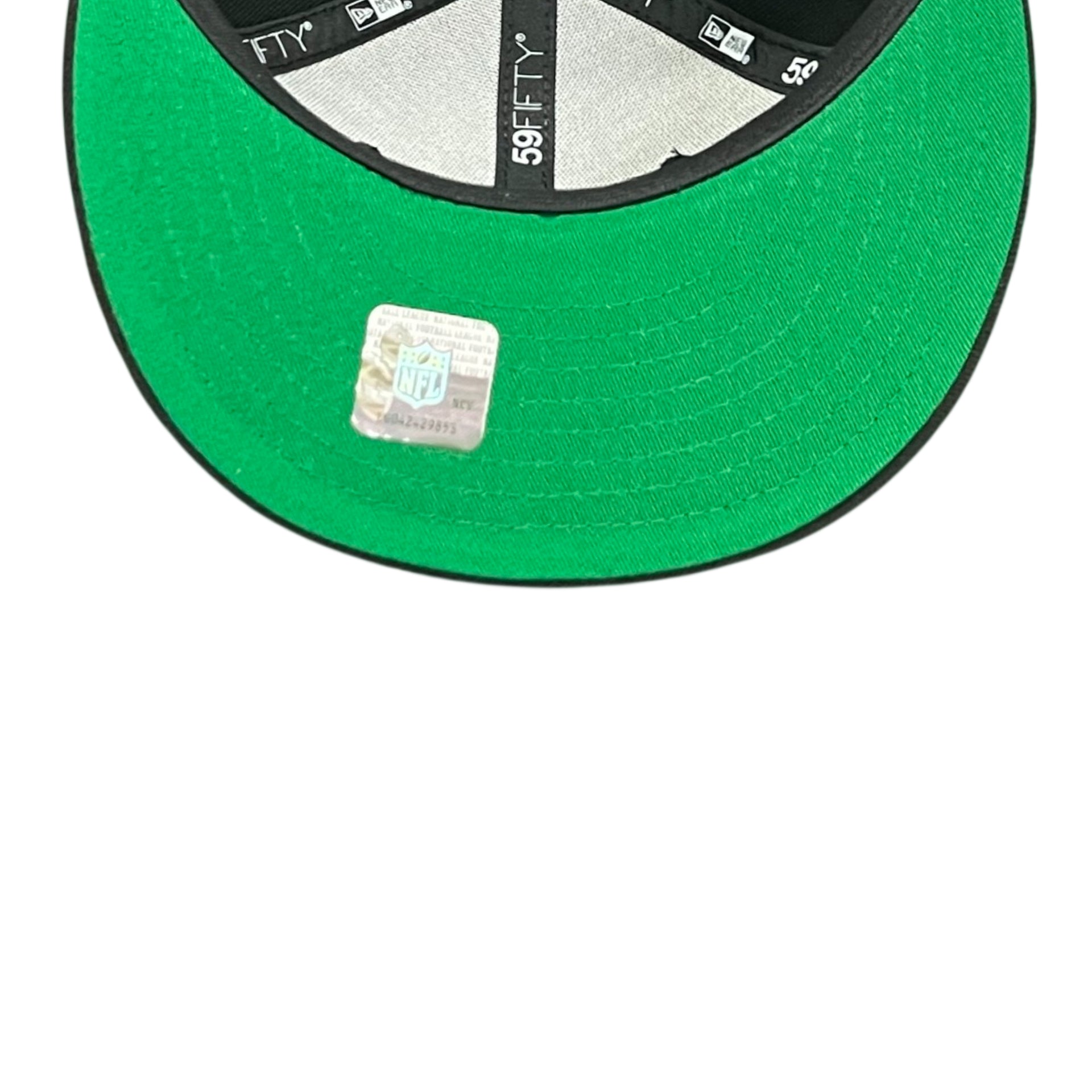 Close-up of a green baseball cap with a brand logo on a white background