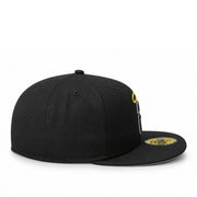 side view of New Era Los Angeles Anaheim Angels Cooperstown 59FIFTY fitted hat in black with lowercase Angels logo and yellow halo.