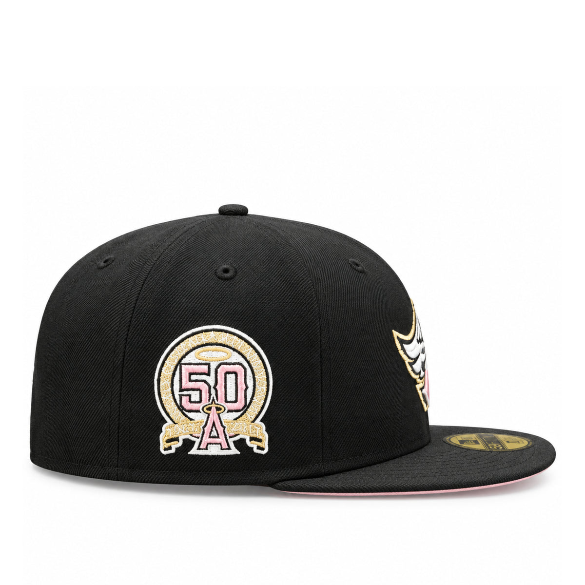Side view of black Los Angeles Angels 59FIFTY fitted cap featuring the embroidered 50th Anniversary patch in pink, white and metallic gold