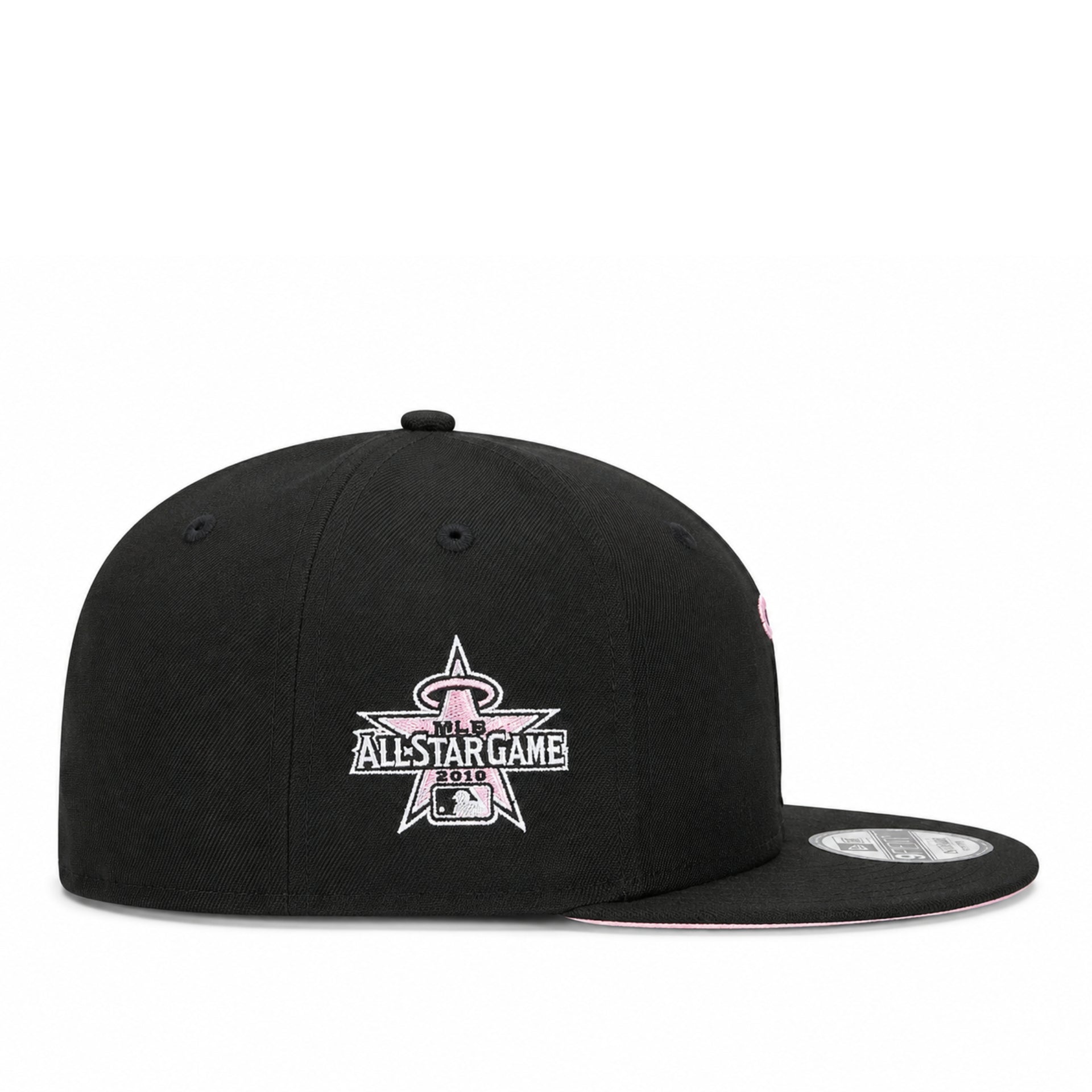 A cream and navy blue New Era 59FIFTY fitted cap featuring a custom embroidered panda patch on the front, displayed on a clean white background.