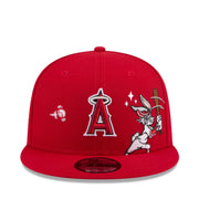 Red baseball cap with a logo and cartoon character on a white background