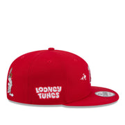 Red 'Looney Tunes' cap on a white background