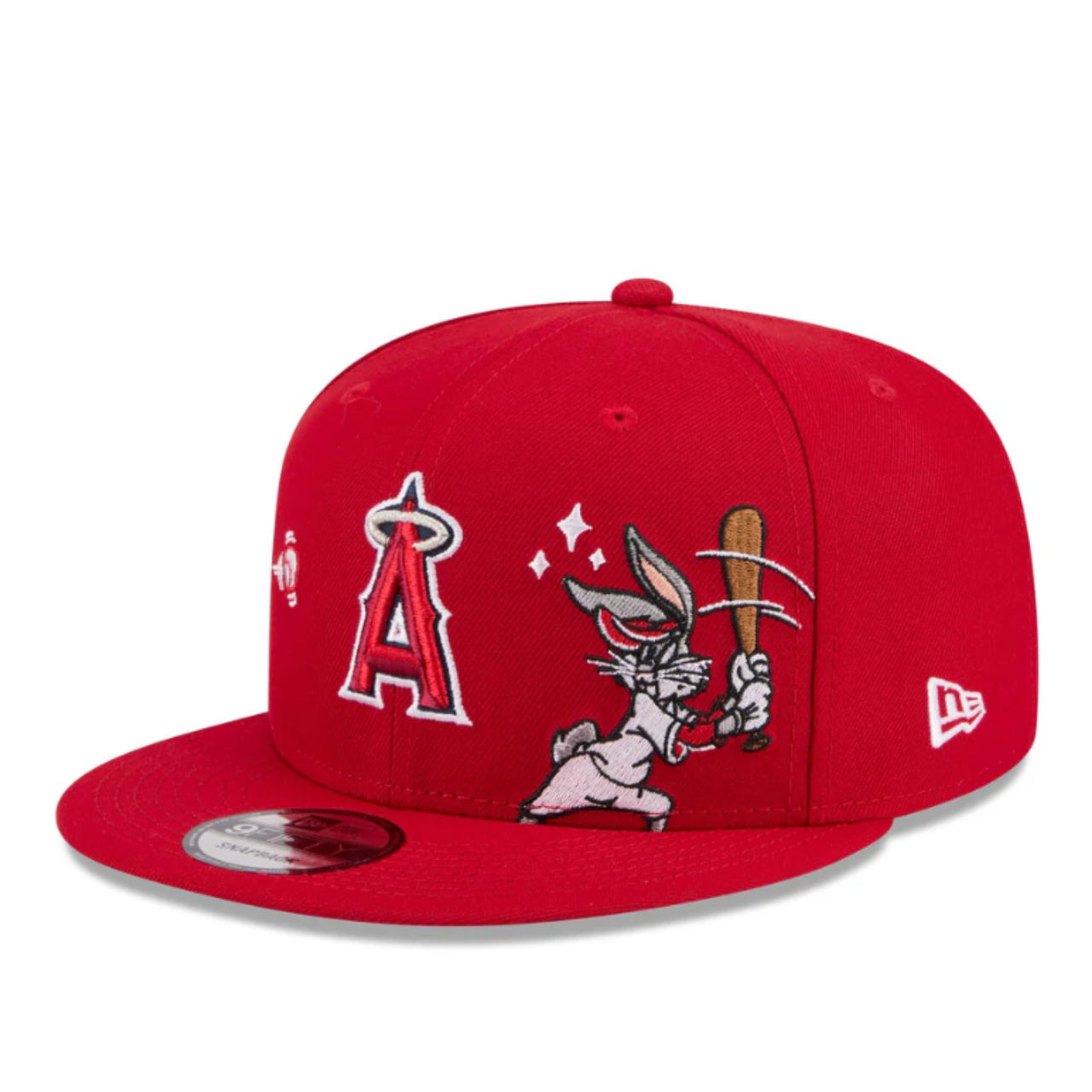 Red baseball cap with cartoon character design on a white background