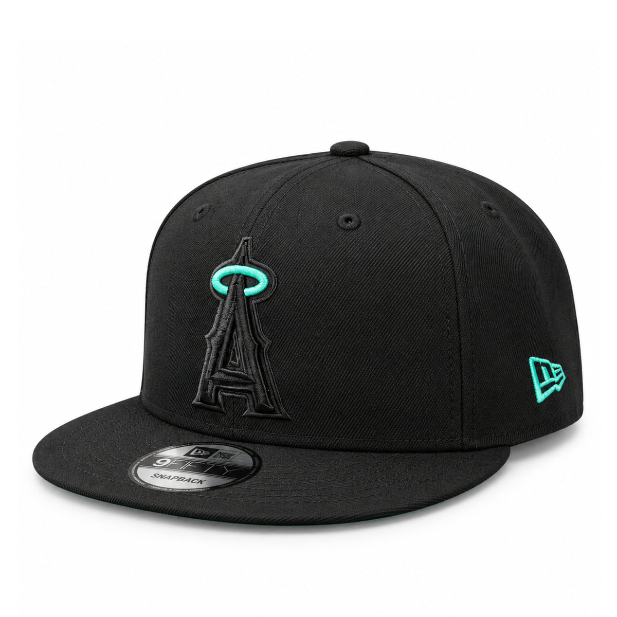 Angled front view of New Era Los Angeles Angels black snapback cap featuring a tonal black A logo with mint halo