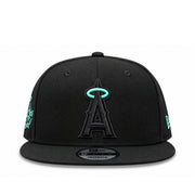 Front view of Los Angeles Angels New Era 9FIFTY black snapback hat with black embroidered A and mint green halo
