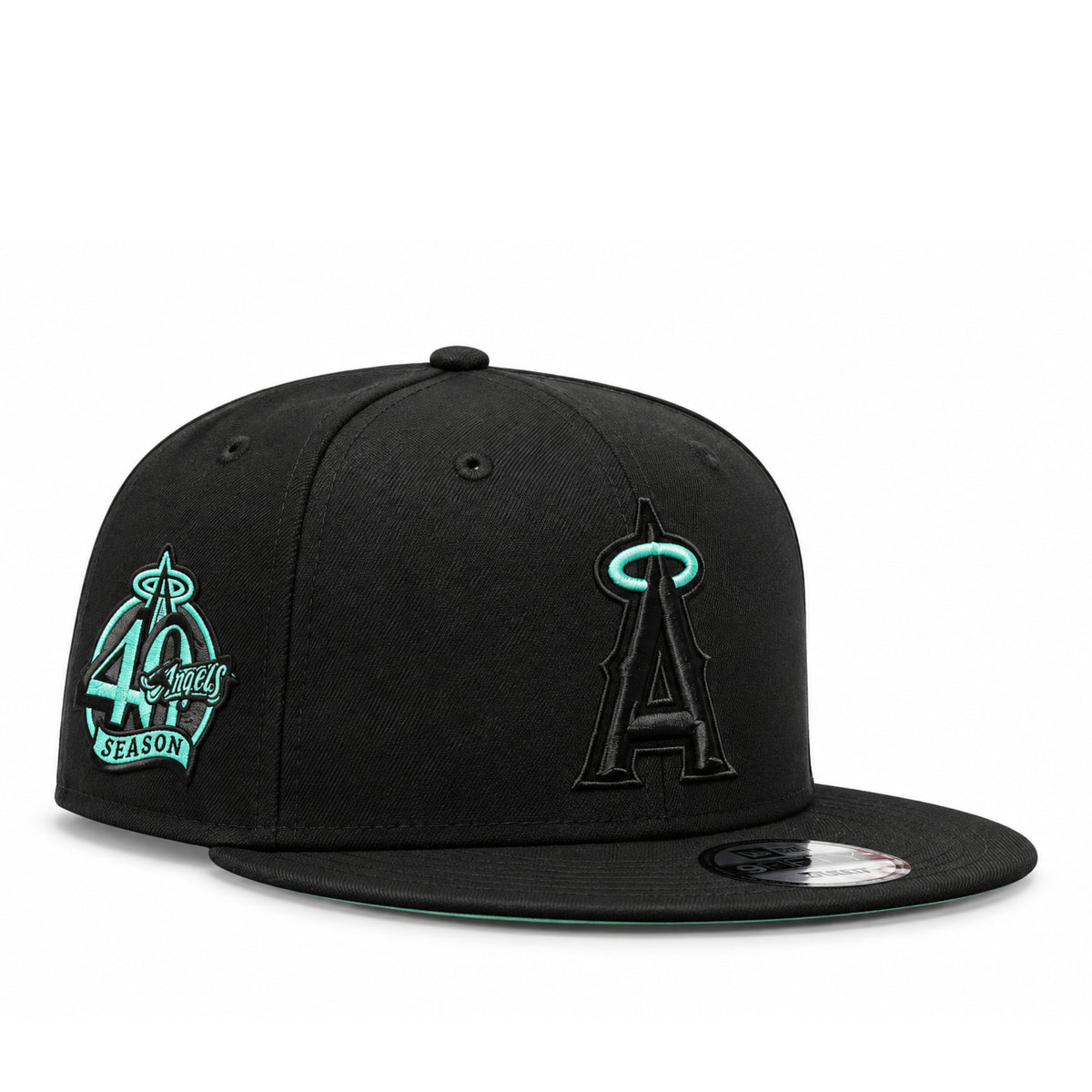 New Era Los Angeles Angels black 9FIFTY snapback hat with mint halo logo and 40th Season side patch, three-quarter view