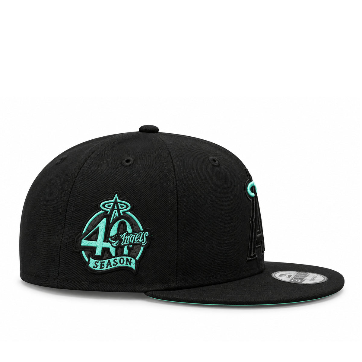 Side view of black Los Angeles Angels 9FIFTY snapback featuring the mint green Angels 40th Season embroidered patch