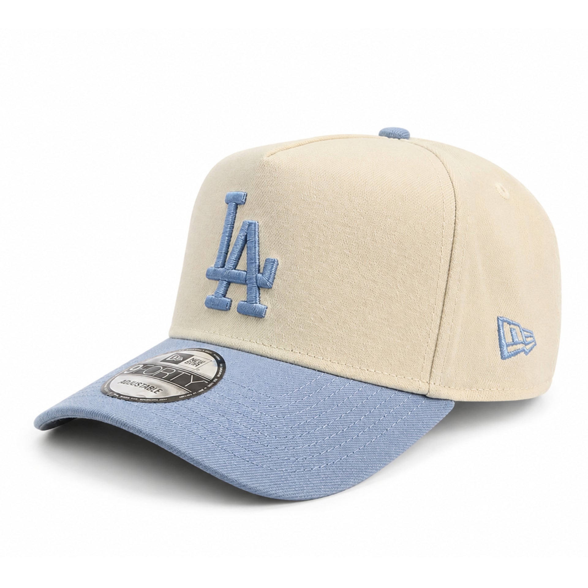 Beige and blue baseball cap with LA Dodgers logo on a white background