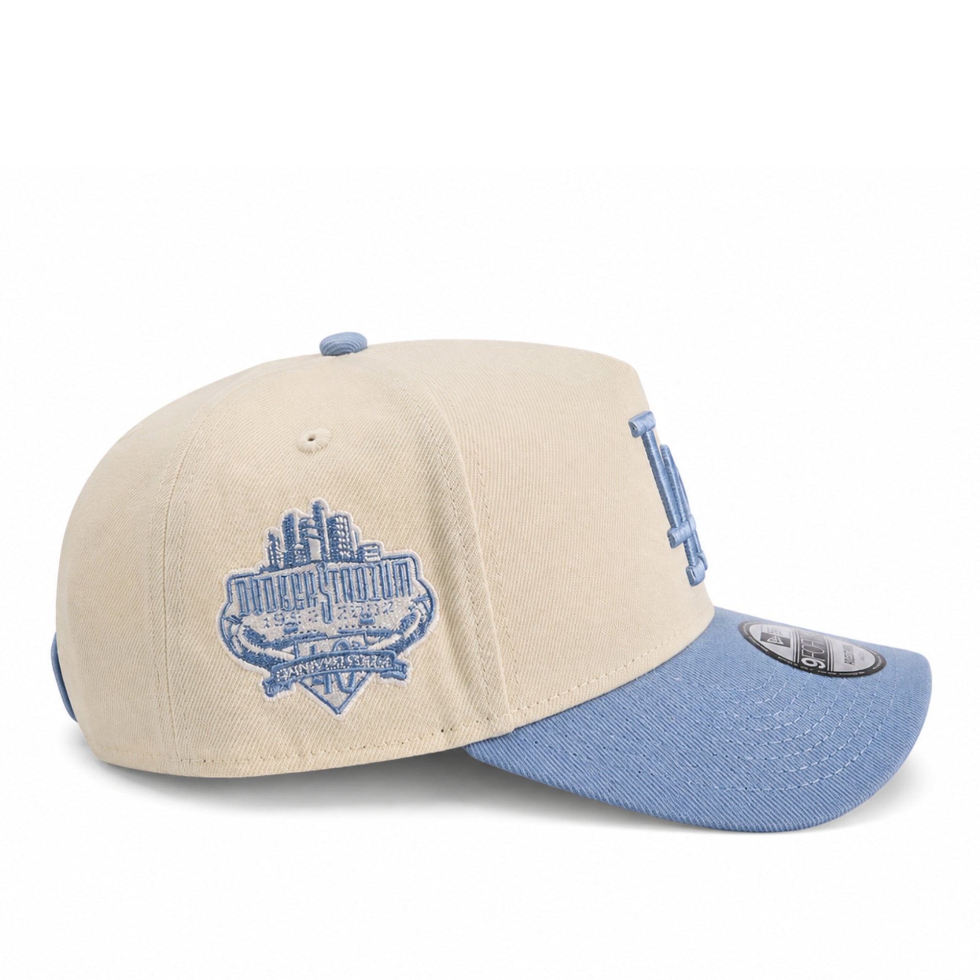 Side view of New Era Los Angeles Dodgers 40th Stadium 9FORTY A-Frame Snapback Hat in Chrome and Sky Blue