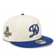 Baseball cap with 'LA' logo and 2024 World Series Champions patch on a white background