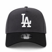 Black cap with white logo on a white background