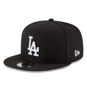 New Era Los Angeles Dodgers black white logo 9fifty snapback hat front view