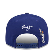 Blue cap with 'Bugs' logo and character on a white background