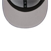 Close-up of a gray cap with a black brim on a white background