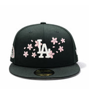 front of New Era Los Angeles Dodgers Cherry Blossom 2025 World Series Black 59FIFTY Fitted Hat