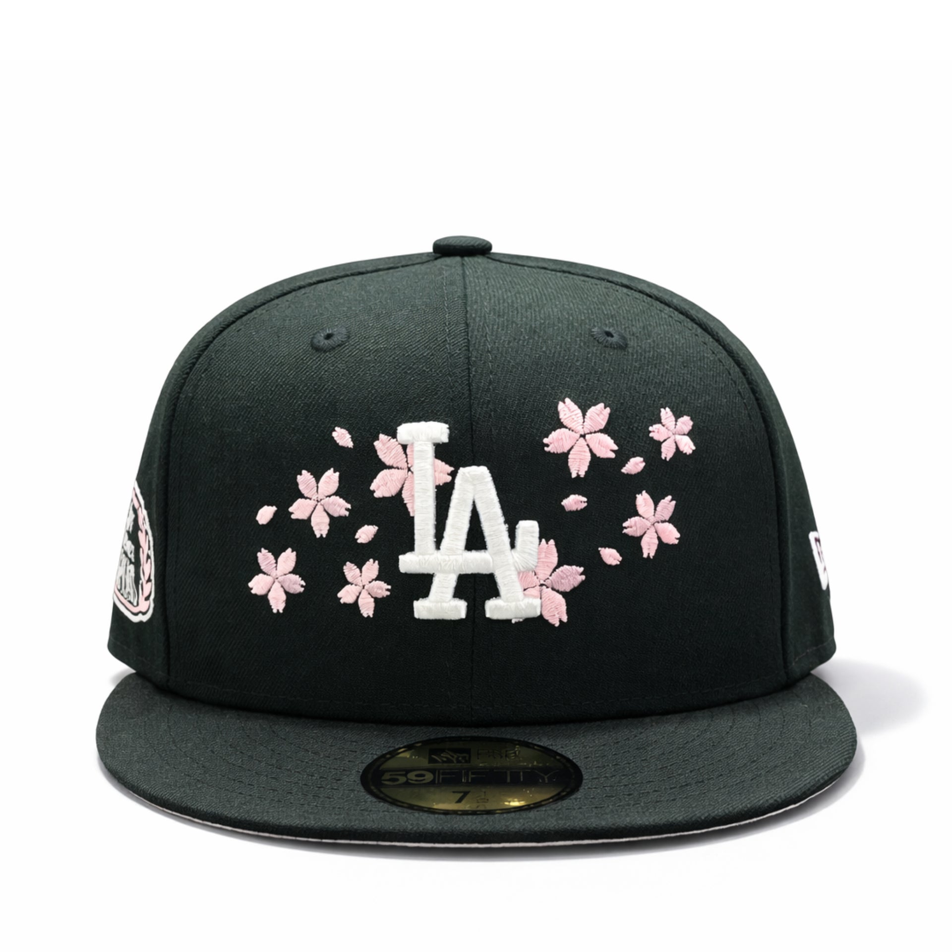 front of New Era Los Angeles Dodgers Cherry Blossom 2025 World Series Black 59FIFTY Fitted Hat